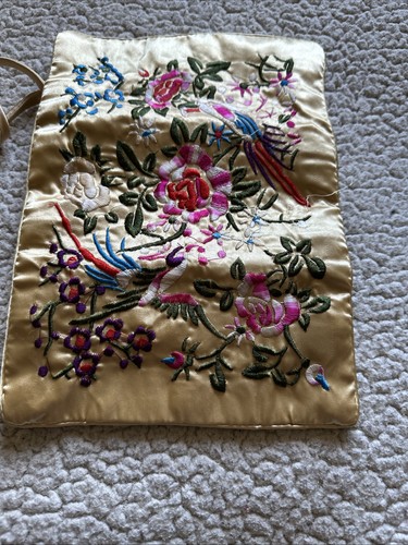 Gold satin travel jewelry roll